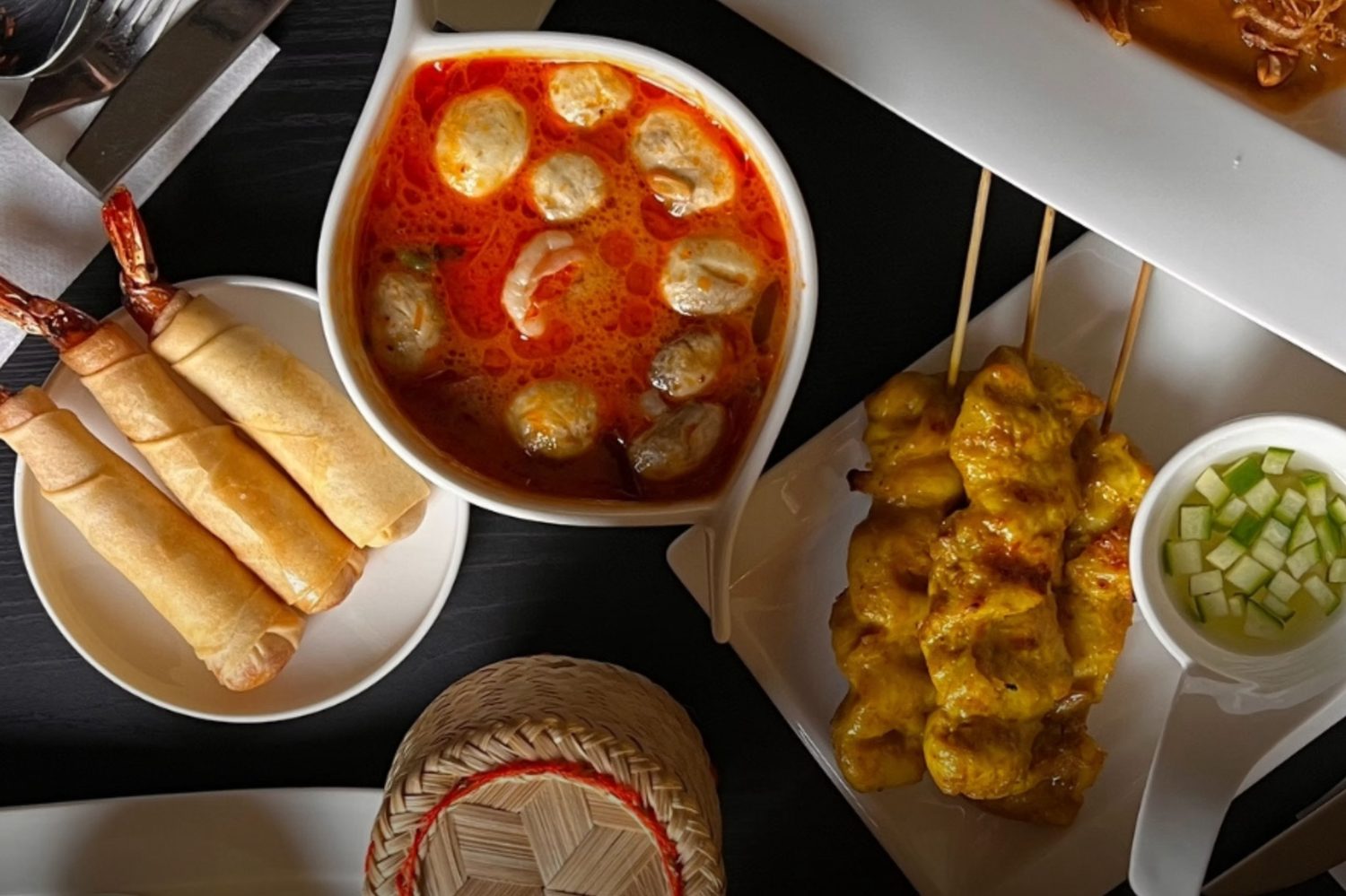 Thai starters at Tom Yam Monton: tom yam soup, spring rolls, prawn rolls, chicken satay and sticky rice